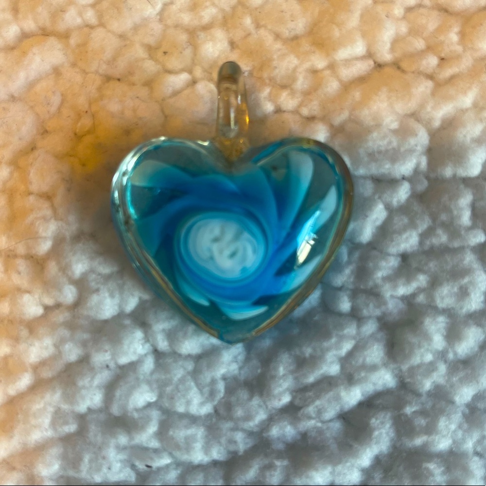 Heart shaped glass pendant that just needs a chain.